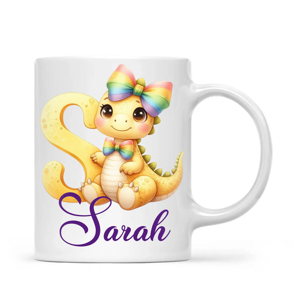 Personalised Yellow Dino Alphabet Kids Mug – Custom Name Cup with Cute Dinosaur & Rainbow Bow | 11 oz, 6 oz & Enamel Options