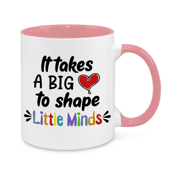 It Takes Big Heart to Shape Little Minds Novelty Mug, white mug with pink handle and inside